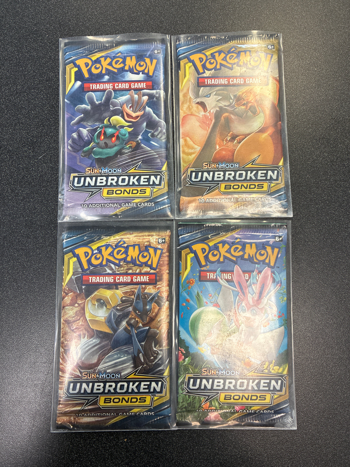 Unbroken Bonds Booster Pack Art Set (4)